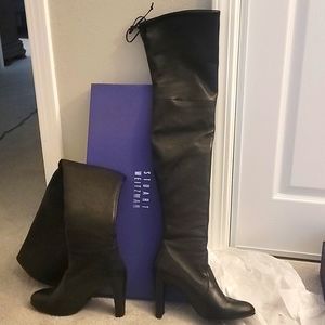 Thigh high leather boots